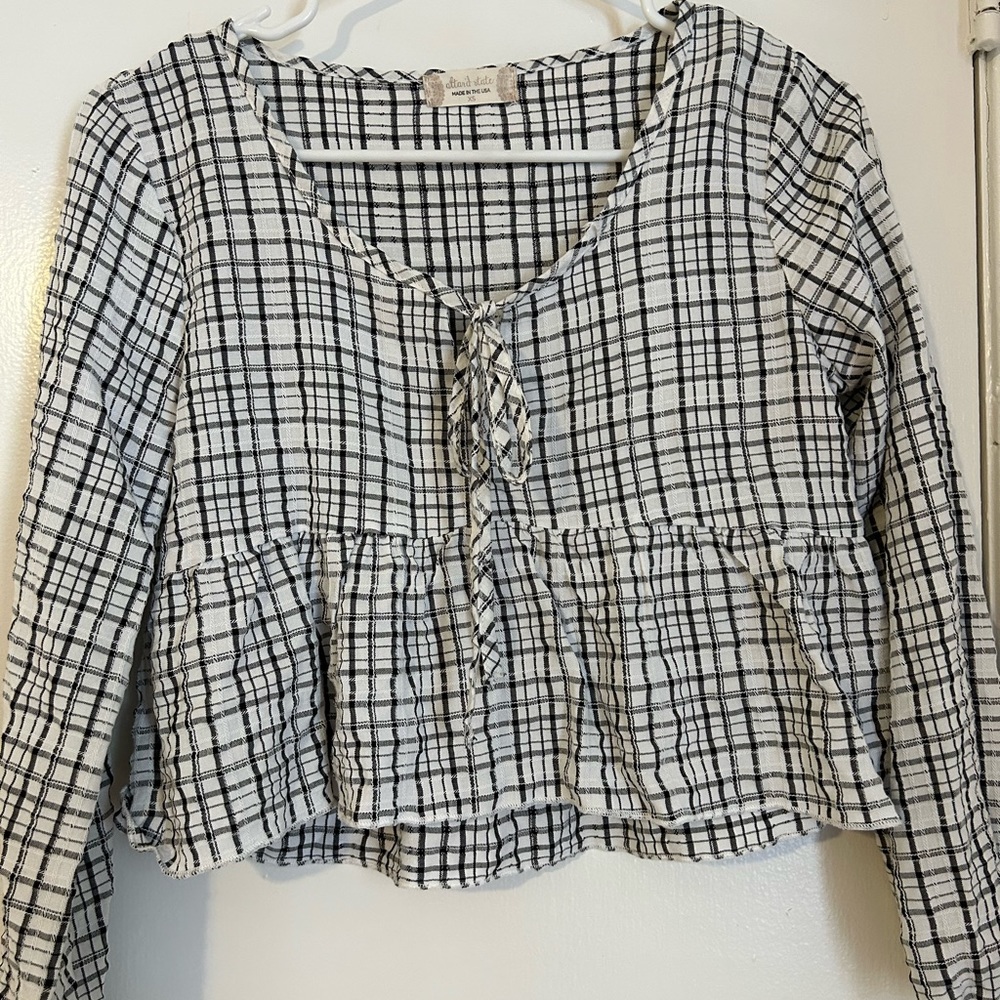 Long sleeve peplum blouse